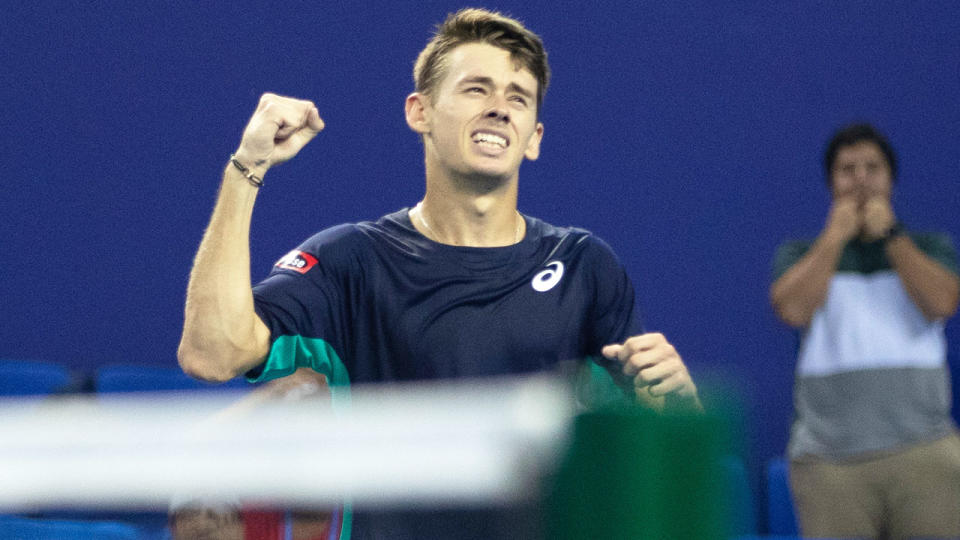 Alex de Minaur, pictured here celebrating his victory.