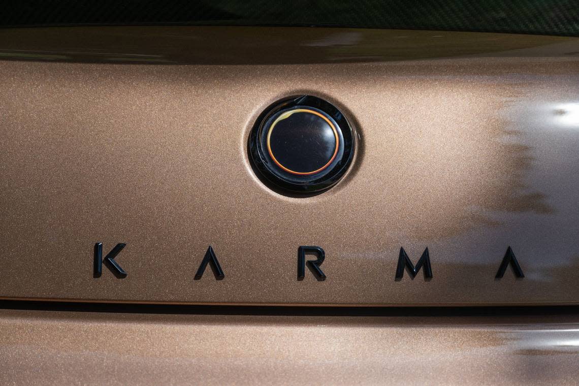 The logo for Karma vehicles is a solar eclipse, seen on a Karma Revero, a range-extended luxury electric on display at the Capitol on Wednesday. Hector Amezcua/hamezcua@sacbee.com