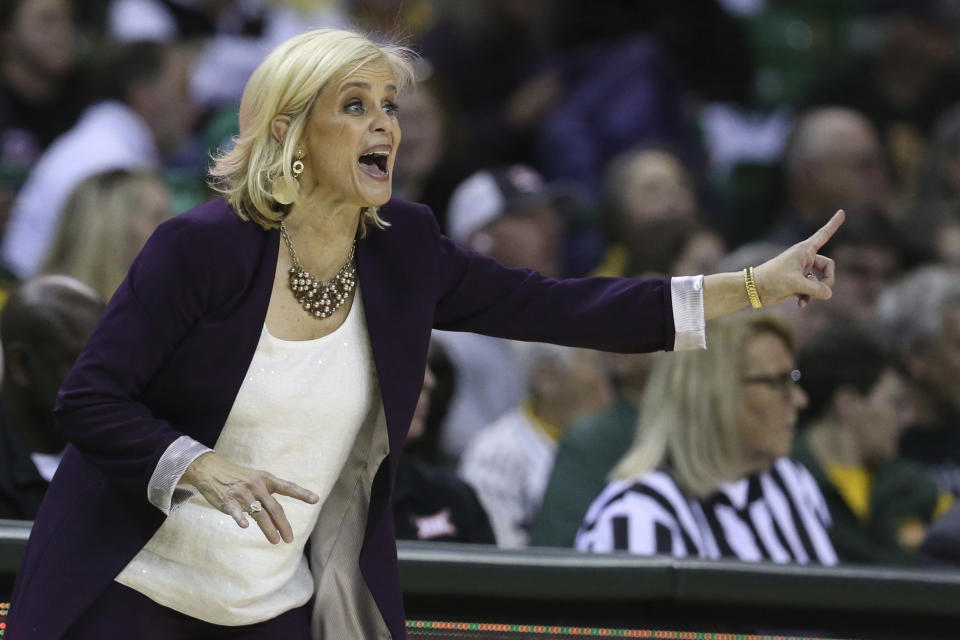 Baylor head coach Kim Mulkey calls in an offensive play in the second half of an NCAA college basketball game against West Virginia, Saturday, Jan. 18, 2020, in Waco, Texas. (AP Photo/Rod Aydelotte)