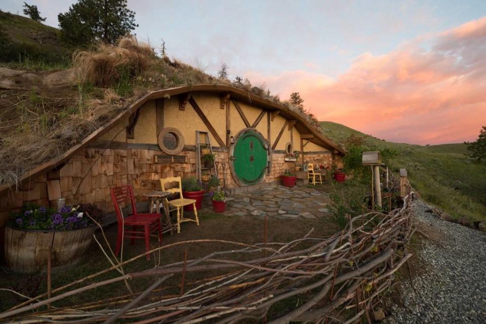 <h2>Orondo, Washington</h2> <p>Live out your <em>Hobbit</em> fantasies (it's a thing) in this underground earth home. Tucked into the scenic Columbia River Gorge, <a rel="nofollow noopener" href="https://www.airbnb.com/rooms/8794484?s=TlKxbwCt" target="_blank" data-ylk="slk:the one-bedroom rental;elm:context_link;itc:0;sec:content-canvas" class="link ">the one-bedroom rental </a>features rustic decor (a custom cordwood floor and metalwork), circular windows and doors and a seriously unforgettable view.</p> <h4>Airbnb</h4>