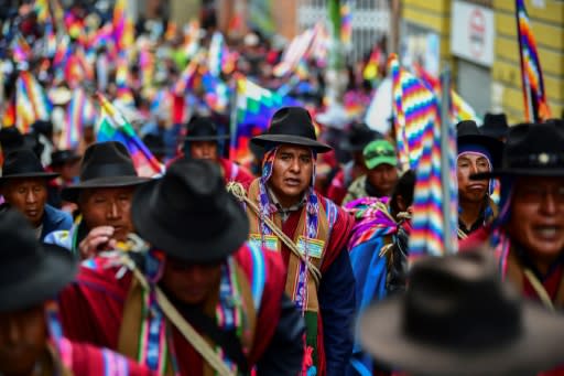 Supporters of Bolivian ex-president Evo Morales, who has accused the new interim leader of orchestrating a "coup"