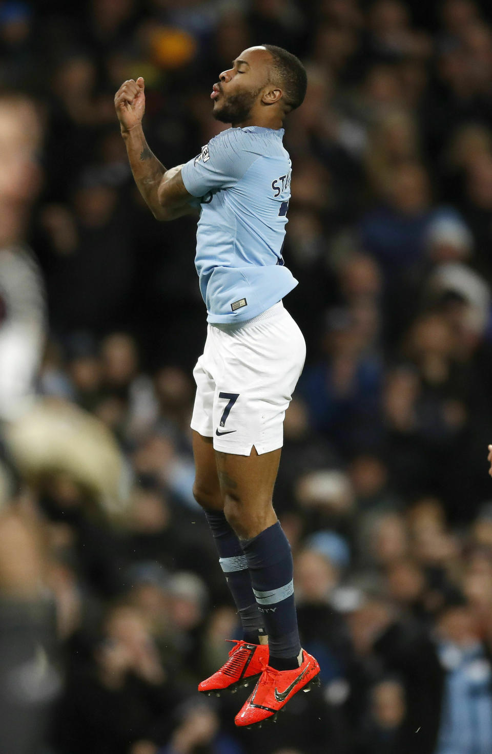 Manchester City's Raheem Sterling celebrates scoring during the English Premier League soccer match between Manchester City and Watford at the Etihad Stadium, Manchester, England, Saturday March 9, 2019. (Martin Rickett/PA via AP)