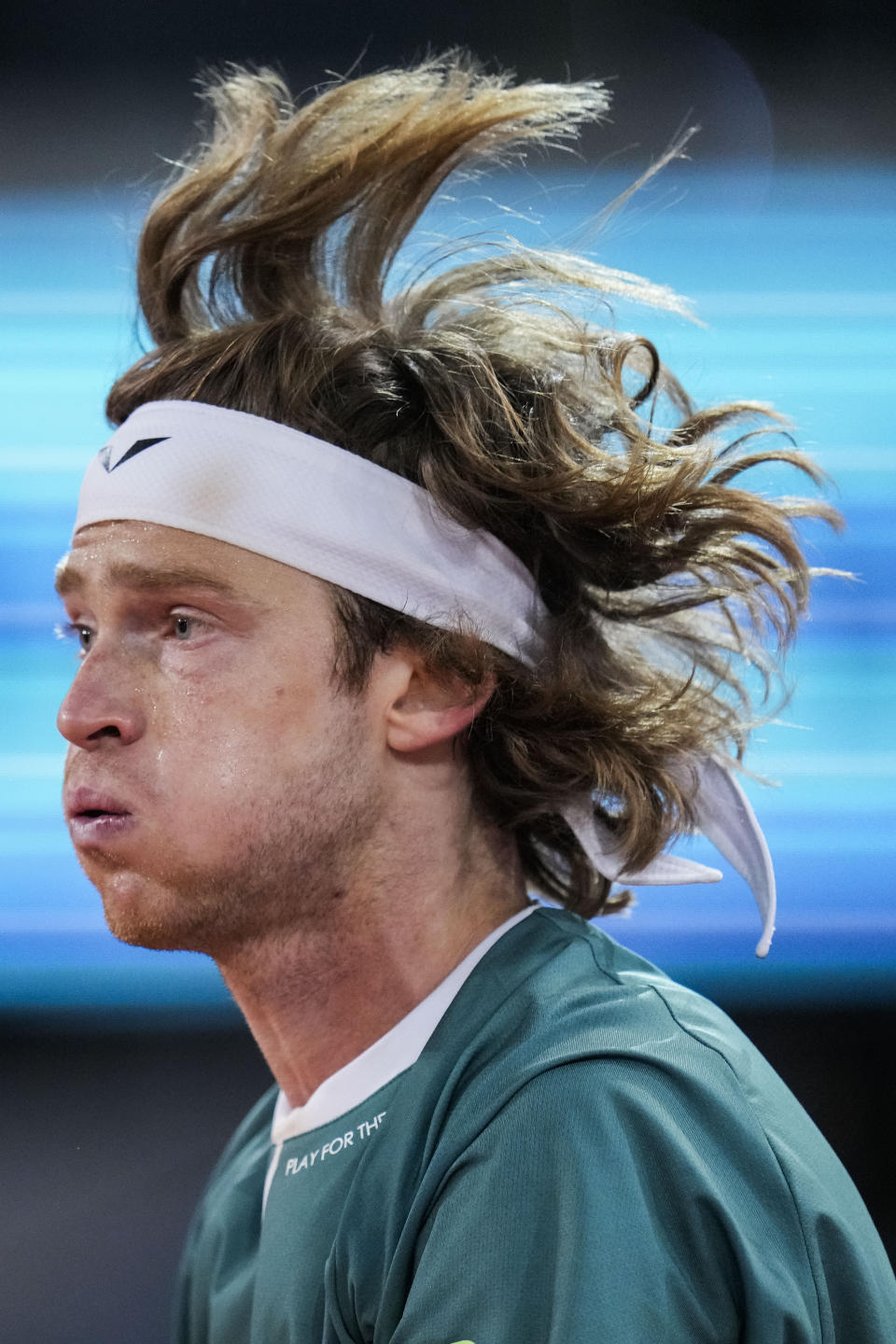 Andrey Rublev, of Russia, competes against Carlos Alcaraz, of Spain, during the Mutua Madrid Open tennis tournament in Madrid, Wednesday, May 1, 2024. (AP Photo/Manu Fernandez)