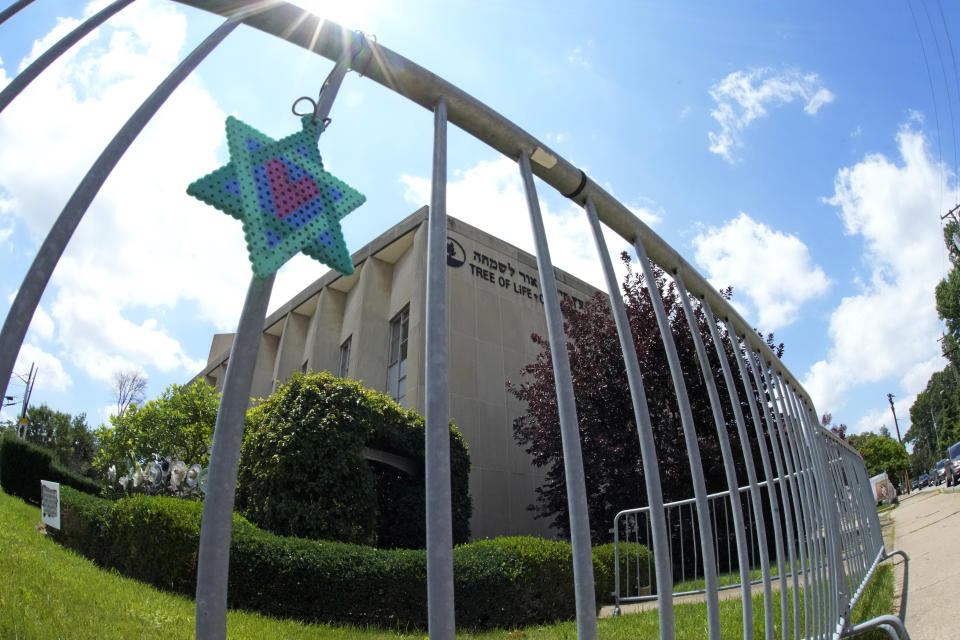 A Star of David hands from a fence outside the dormant landmark Tree of Life synagogue in Pittsburgh's Squirrel Hill neighborhood on Thursday, July 13, 2023, the day a federal jury announced they had found Robert Bowers, who in 2018 killed 11 people at the Tree of Life synagogue, eligible for the death penalty. The next stage of the trial with present further evidence and testimony on whether he should be sentenced to death or life in prison. It stands as the deadliest attack on Jewish people in U.S. history. (AP Photo/Gene J. Puskar/File)