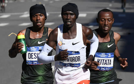 Athletics - New York City Marathon - New York City, New York, U.S. - November 4, 2018 Kenya's Geoffrey Kamworor in action with Ethiopia's Lelisa Desisa and Shura Kitata during the Professional Men's race REUTERS/Darren Ornitz