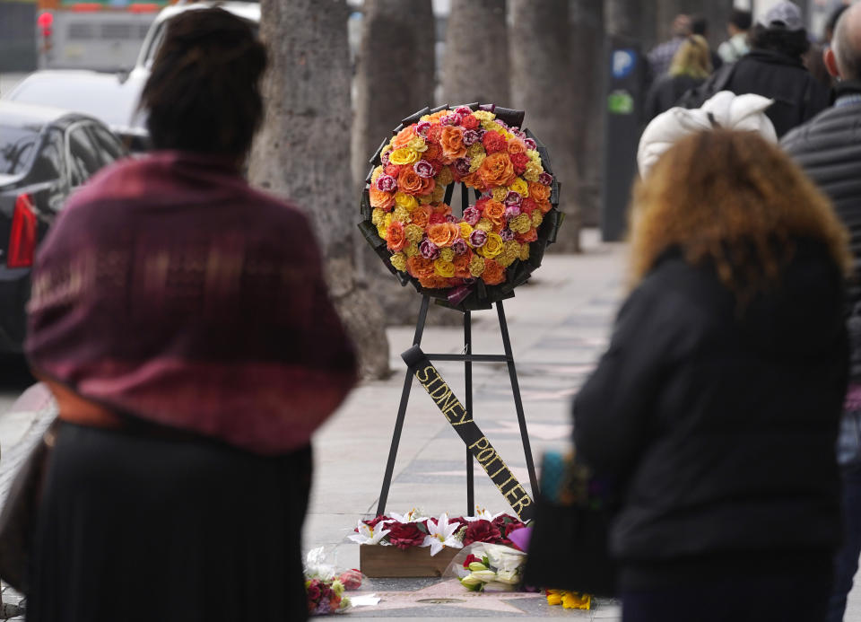 A wreath sits atop the late actor Sidney Poitier's star on the Hollywood Walk of Fame, Friday, Jan. 7, 2022, in Los Angeles. Poitier, the first Black actor to win an Academy Award for best lead performance and the first to be a top box-office draw, died Thursday at 94. (AP Photo/Chris Pizzello)