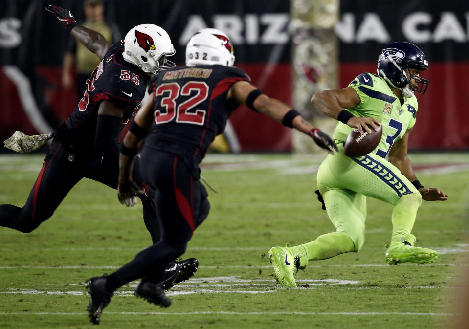 Seattle Seahawks quarterback Russell Wilson provided one of the season's best highlights on a long play to Doug Baldwin. (AP)