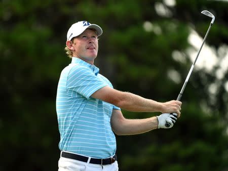 Aug 17, 2018; Greensboro, NC, USA; Brandt Snedeker watches his tee shot on the sixteenth hole during the second round of the Wyndham Championship golf tournament at Sedgefield Country Club. Mandatory Credit: Rob Kinnan-USA TODAY Sports