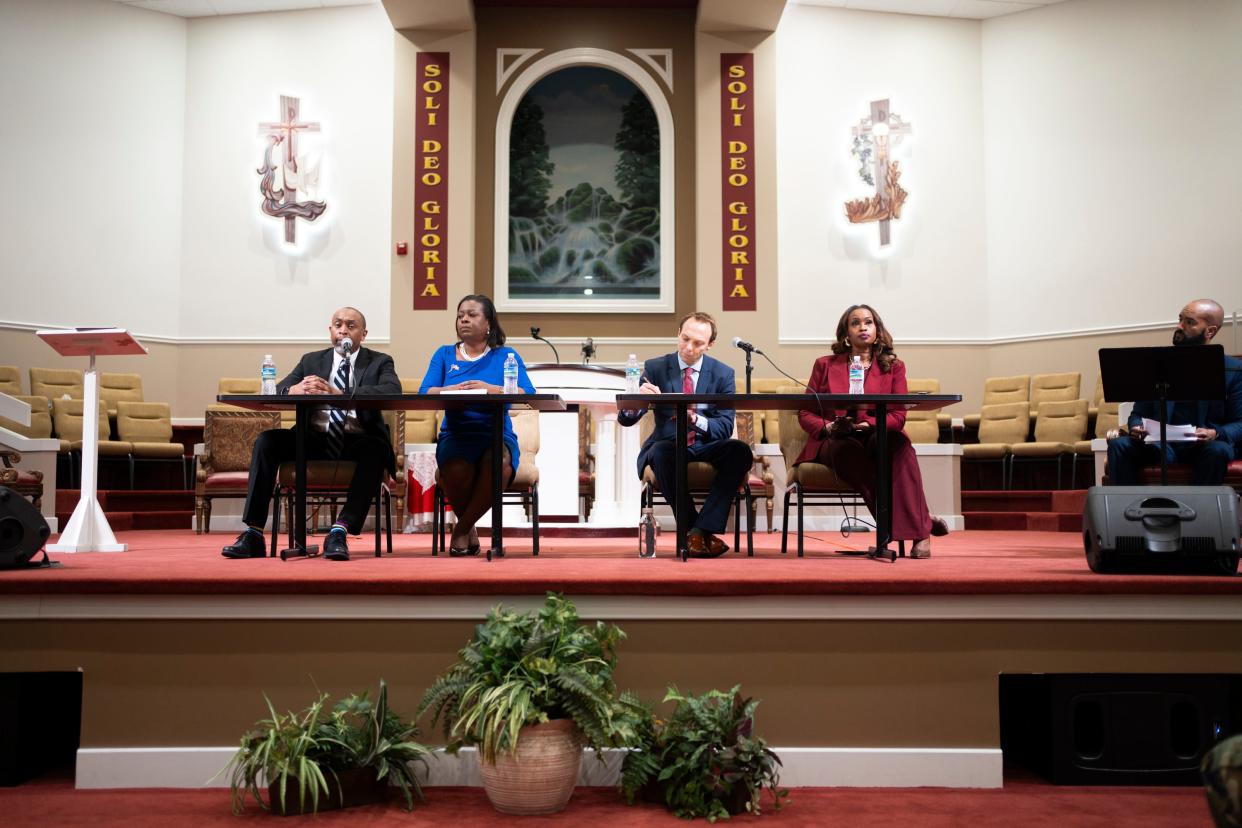 Three Democrats and one Republican running for Franklin County prosecutor answer questions from the audience during a debate Thursday night at Mount Hermon Missionary Baptist Church in Columbus' Bridgeview neighborhood. Current Prosecutor Gary Tyack is retiring and not seeking reelection.