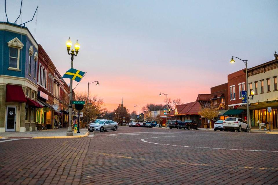 A Swedish flag hangs on a light pole on the corner of Main Street and Lincoln Street in downtown Lindsborg, Kansas.