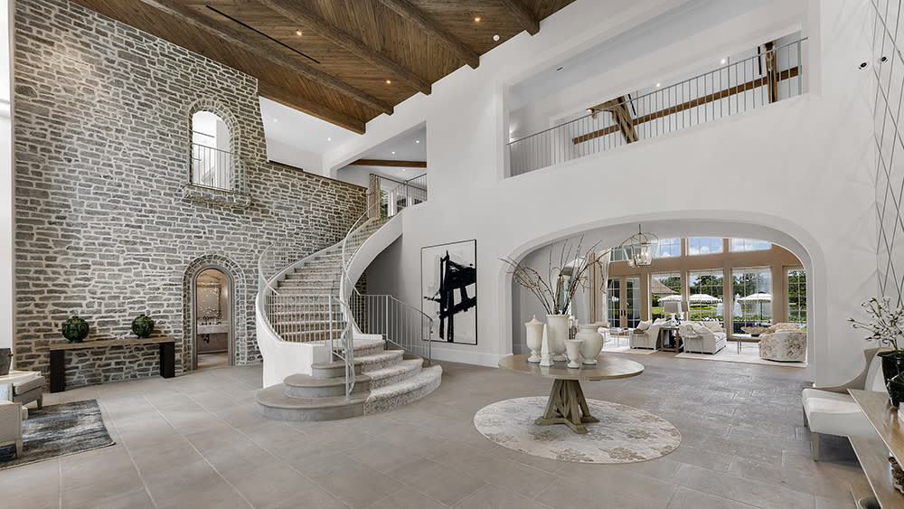 The spacious entry foyer at 13000 Lewin Lane - Credit: The Jills Zeder Group/1 Oak Studios