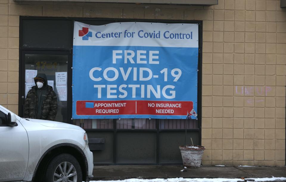 Center for COVID Control opened a location in Rochester, N.Y. A sign on the door on Wednesday, Jan. 12, 2022, said only three people were allowed inside at one time.