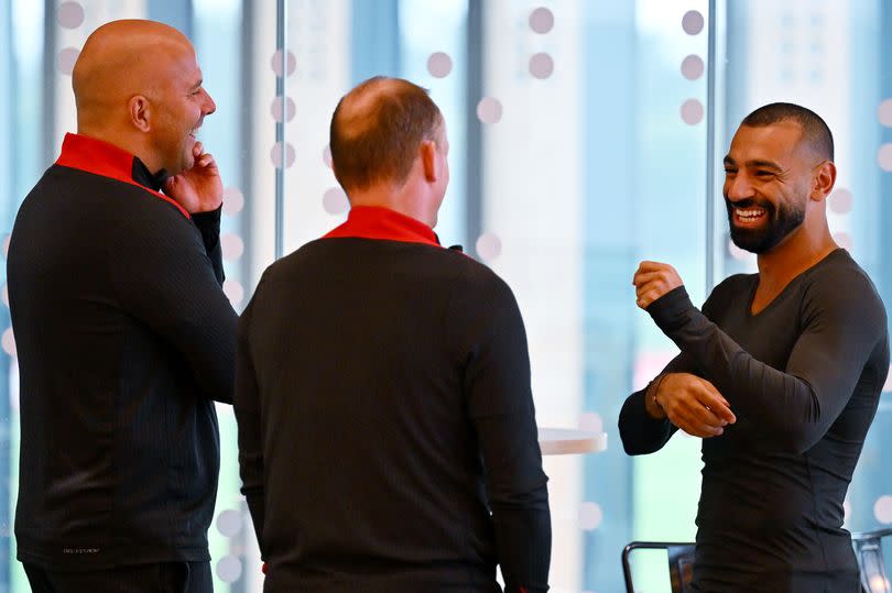 KIRKBY, ENGLAND - JULY 10: (THE SUN OUT, THE SUN ON SUDNAY OUT) Arne Slot head coach of Liverpool meeting Mohamed Salah of Liverpool at the AXA Training Centre before the training session on July 10, 2024 in Kirkby, England.