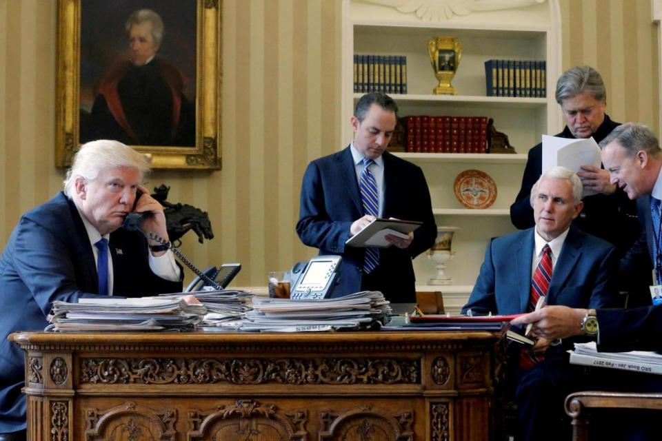 Crisis: Donald Trump with members of his top team at the White House, including Steve Bannon (Reuters)