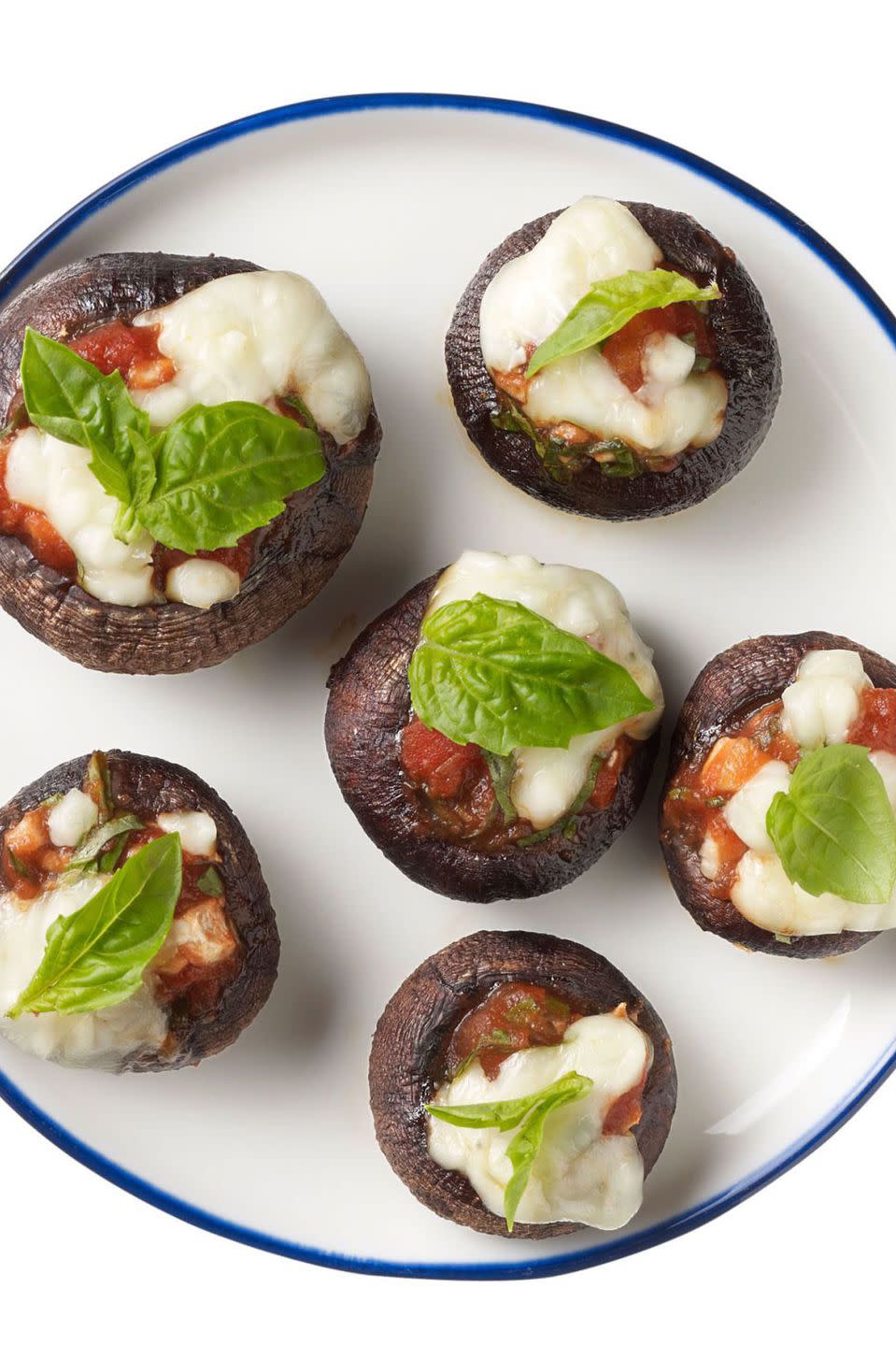 <p>Stuffed mushrooms might just become your child's new favorite snack - especially since this recipe packs them full of cheesy goodness.</p><p><strong><a rel="nofollow noopener" href="https://www.redbookmag.com/food-recipes/advice/g2459/healthy-dinner-recipes-from-hungry-girl/?slide=3" target="_blank" data-ylk="slk:Get the recipe.;elm:context_link;itc:0;sec:content-canvas" class="link ">Get the recipe.</a></strong></p>