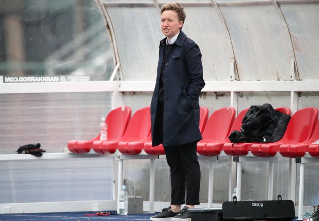 Bev Priestman watching on from the dugout