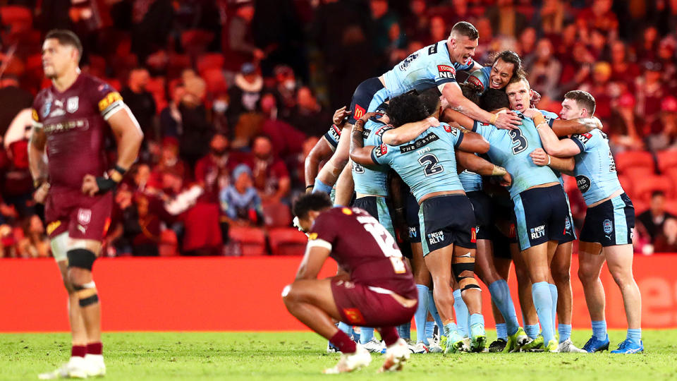 Queensland players were devastated after being held scoreless by NSW in State of Origin II. (Photo by Chris Hyde/Getty Images)