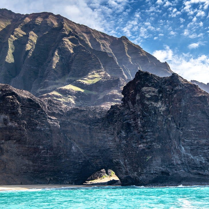 <span class="article__caption">Boating along the coastline, Na Pali Coast State Wilderness Park</span> (Photo: Daniel Sullivan / from <em>Maui Mauka to Makai)</em>