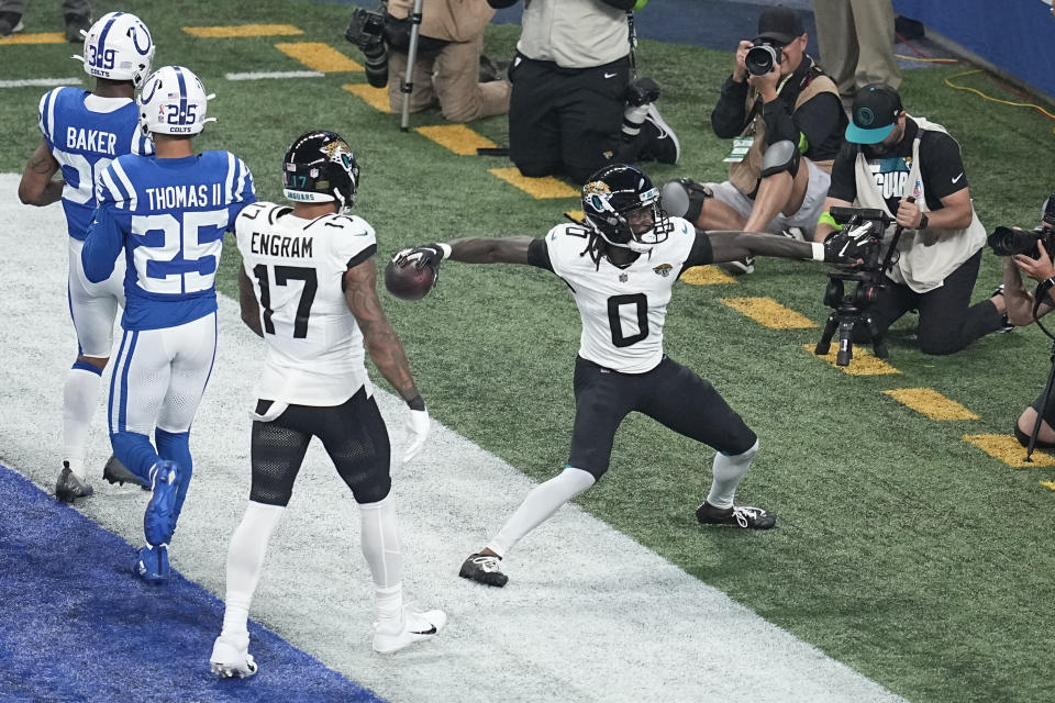 Jacksonville Jaguars wide receiver Calvin Ridley (0) celebrates after scoring during the first half of an NFL football game against the Indianapolis Colts Sunday, Sept. 10, 2023, in Indianapolis. (AP Photo/Darron Cummings)