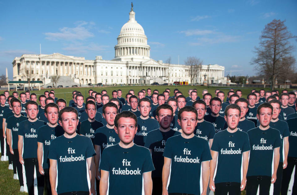 <div class="inline-image__caption"><p>Cardboard cutouts of Facebook founder and CEO Mark Zuckerberg stand outside the U.S. Capitol in April 2018.</p></div> <div class="inline-image__credit">Saul Loeb/AFP via Getty</div>