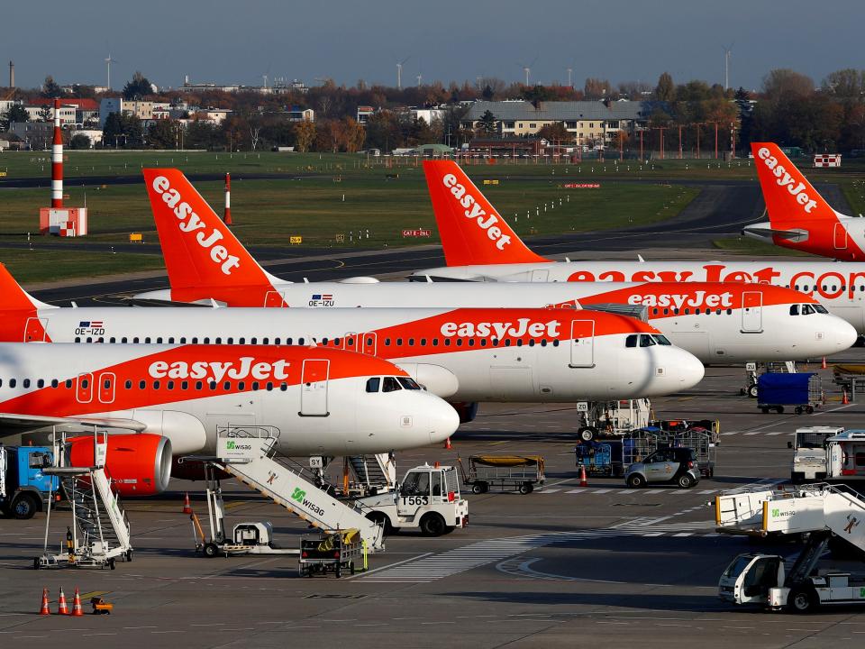 FILE PHOTO: EasyJet airplanes are pictured at Tegel airport in Berlin, Germany, November 14, 2019. REUTERS/Fabrizio Bensch/File Photo