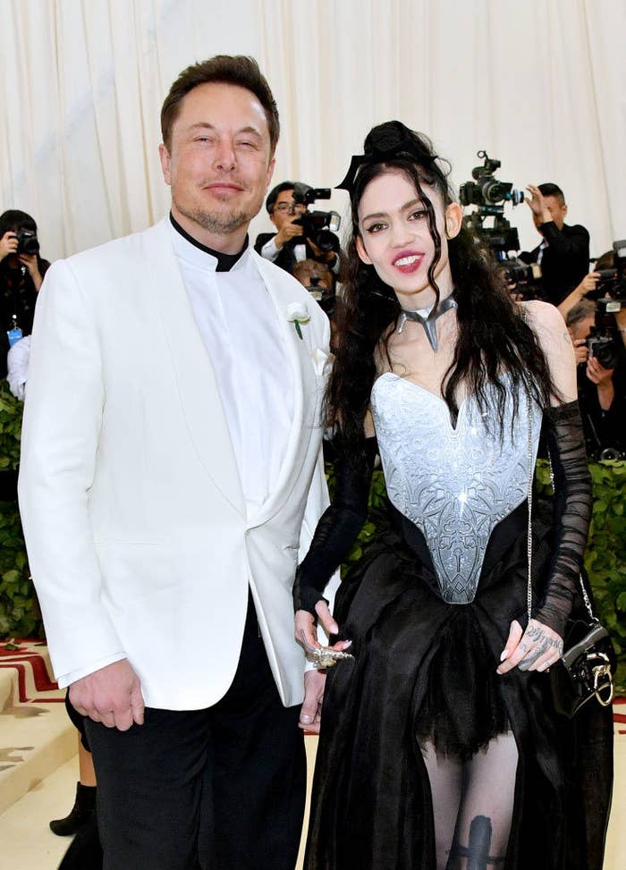 Elon and Grimes on the Met Gala stairs