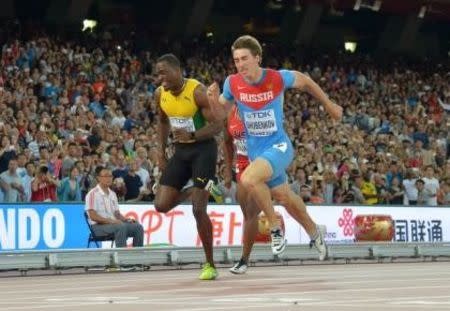 Aug 28, 2015; Beijing, China; Sergey Shubenkov (RUS) defeats Hansle Parchment (JAM) to win the 110m hurdles in a national record 12.98 to 13.03 during the IAAF World Championships in Athletics at National Stadium. Kirby Lee-USA TODAY Sports