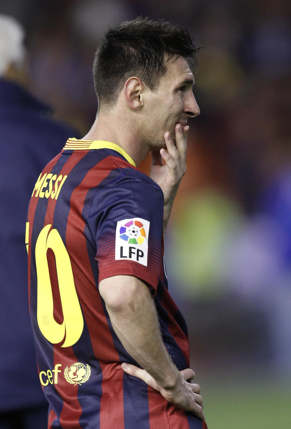 Barcelona's Lionel Messi reacts after Real Madrid won the final of the Copa del Rey between FC Barcelona and Real Madrid at the Mestalla stadium in Valencia, Spain, Wednesday, April 16, 2014. (AP Photo/Alberto Saiz)