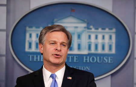 FBI Director Christopher Wray addresses a briefing on election security in the White House press briefing room at the White House in Washington, U.S., August 2, 2018. REUTERS/Carlos Barria