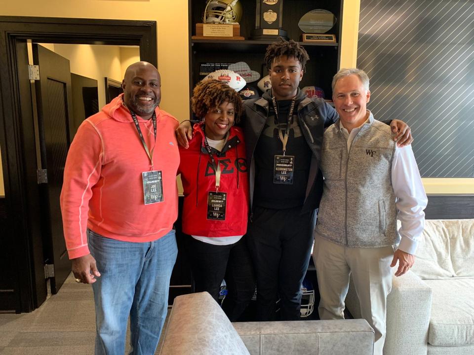 Dwyer junior Kerrington Lee pictured with family and Wake Forest head football coach Dave Clawson on a recent visit to the Demon Deacons' facilities.