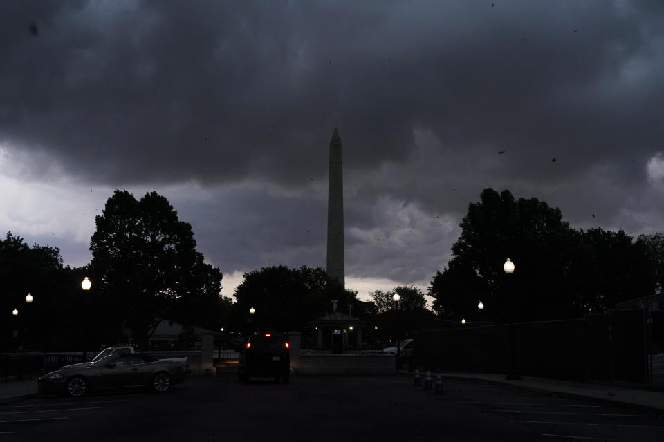 Storm clouds the Washington Monument in Washington, D.C., on Monday, Aug. 7, 2023. / Credit: Jacquelyn Martin / AP