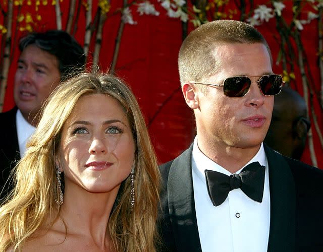 LOS ANGELES – SEPTEMBER 19: Actress Jennifer Aniston and Actor/husband Brad Pitt attend the 56th Annual Primetime Emmy Awards on September 19, 2004 at the Shrine Auditorium, in Los Angeles, California. (Photo by Kevin Winter/Getty Images)