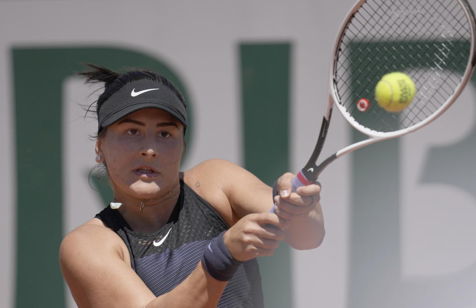Canada's Bianca Andreescu plays a return to Slovenia's Tamara Zidansek during their first round match on day two of the French Open tennis tournament at Roland Garros in Paris, France, Monday, May 31, 2021. (AP Photo/Christophe Ena)