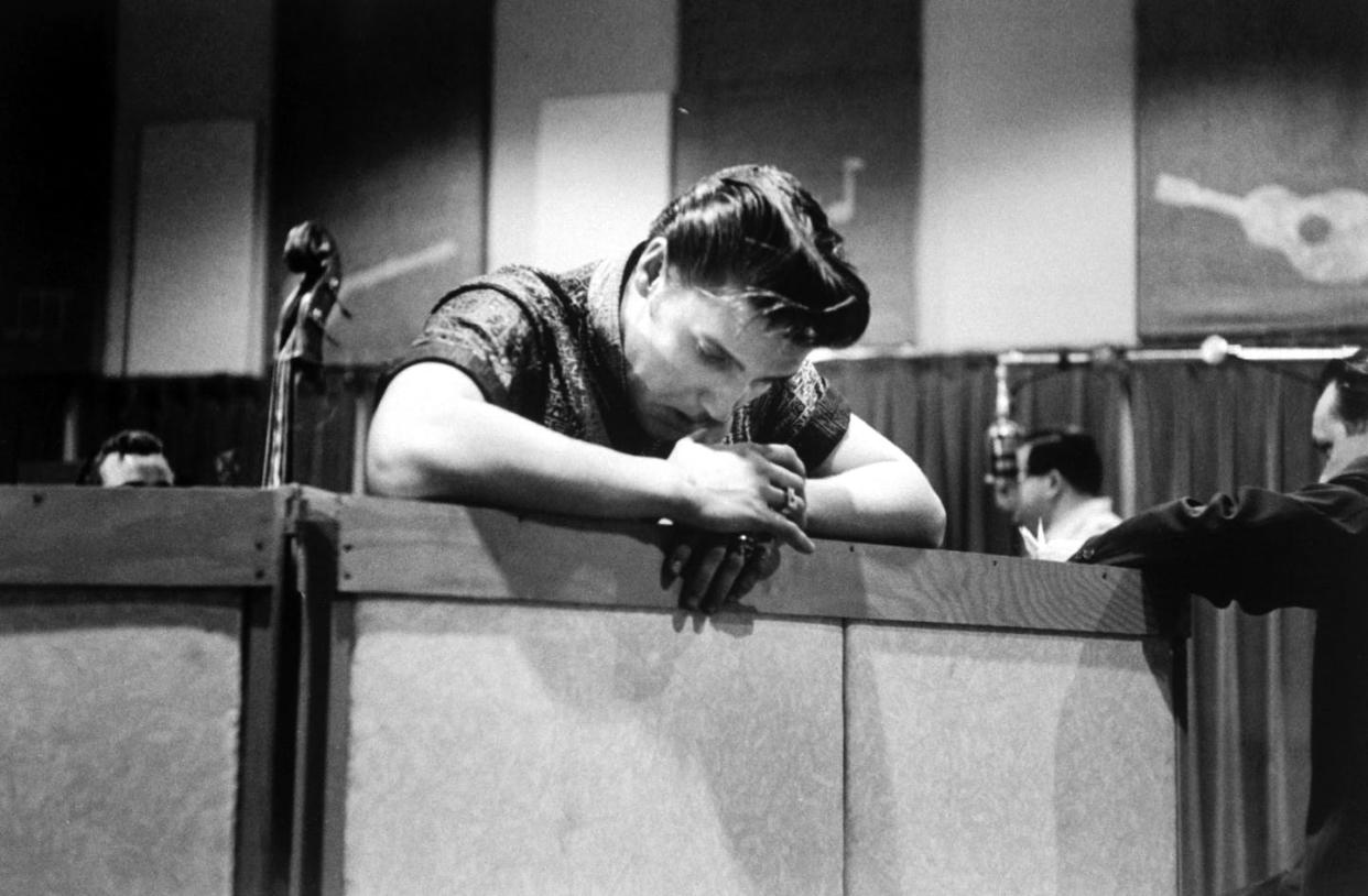 <span class="caption">Pinpointing Elvis Presley's true persona can depend on when and whom you ask.</span> <span class="attribution"><a class="link " href="https://www.gettyimages.com/detail/news-photo/singer-elvis-presley-looking-tired-and-somewhat-dejected-news-photo/50420521?adppopup=true" rel="nofollow noopener" target="_blank" data-ylk="slk:Don Cravens/Getty Images;elm:context_link;itc:0;sec:content-canvas">Don Cravens/Getty Images</a></span>
