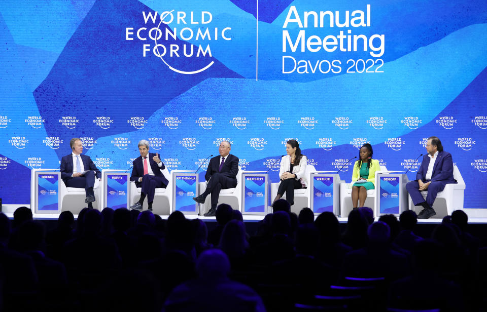 DAVOS, SWITZERLAND - MAY 24: Borge Brende, President of the World Economic Forum (L) Special Presidential Envoy for Climate John Kerry (2nd L), Xie Zhenhua (3rd L) Special Representative for Climate Change Affairs of China , Geraldine Matchett, Member of the Board of Directors, ABB Ltd (3rd R), Kenyan climate activist Elizabeth Wathuti (2nd R), Marc Benioff, CEO of Salesforce.com (R) attend the annual meeting of World Economic Forum in Davos, Switzerland on May 24, 2022. (Photo by Dursun Aydemir/Anadolu Agency via Getty Images)