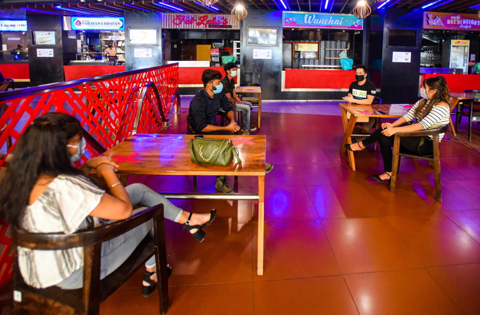NEW DELHI, INDIA - JUNE 8: People in the food court at DLF Saket mall as malls and restaurants reopened to the public following lockdown relaxations in Saket, on June 8, 2020 in New Delhi, India. (Photo by Amal KS/Hindustan Times via Getty Images)