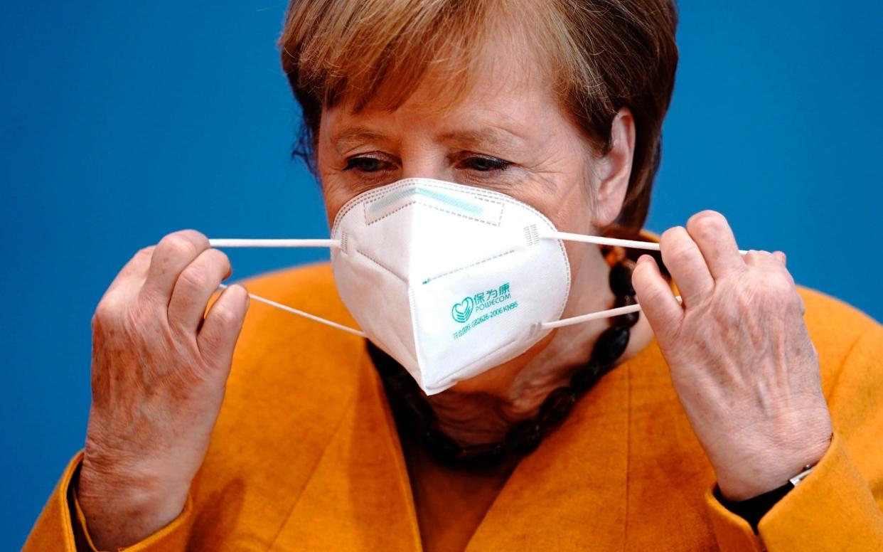 German Chancellor Angela Merkel says it need not be a lonely Christmas despite the pandemic - DPA