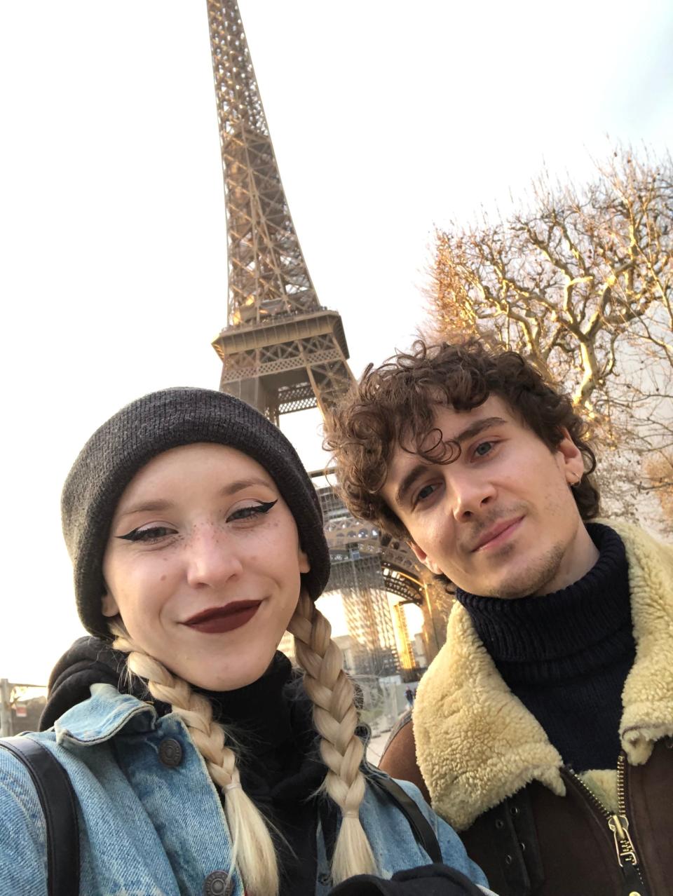 Highberger and Raphael in front of the Eiffel Tower.