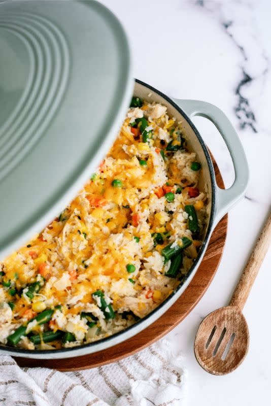 With this creamy chicken and rice casserole skillet recipe, you can get all you need in one dish.<p><strong>Get the recipe: <a href="https://www.sixsistersstuff.com/recipe/creamy-chicken-and-rice-casserole-skillet-recipe/" rel="sponsored" target="_blank" data-ylk="slk:Creamy Chicken and Rice Casserole;elm:context_link;itc:0;sec:content-canvas" class="link ">Creamy Chicken and Rice Casserole</a></strong></p>