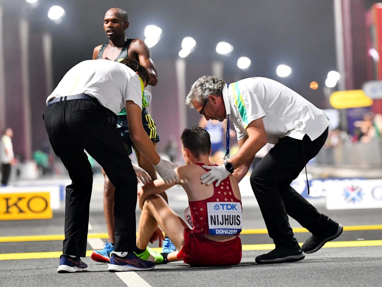 The World Championships marathon in Doha was held at midnight to combat the heat: EPA