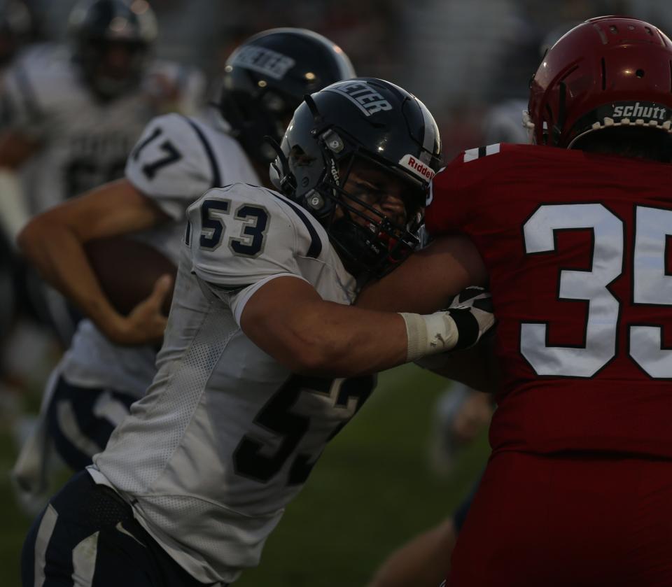 Exeter senior Isaac Beem and the Blue Hawks will welcome rival Winnacunnet on Saturday for a 1 p.m. kickoff.