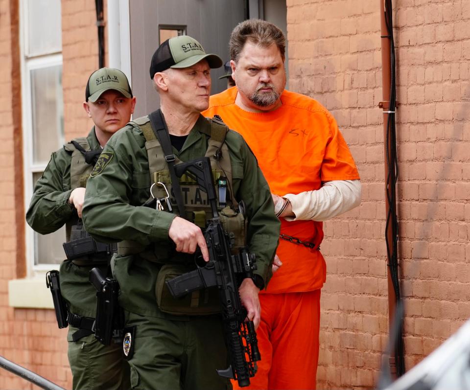 George "Billy" Wagner III exits the back of the Pike County Courthouse after a hearing in March. Wagner attended the 11-minute hearing in jail attire, despite earlier winning a request to appear in street clothes.