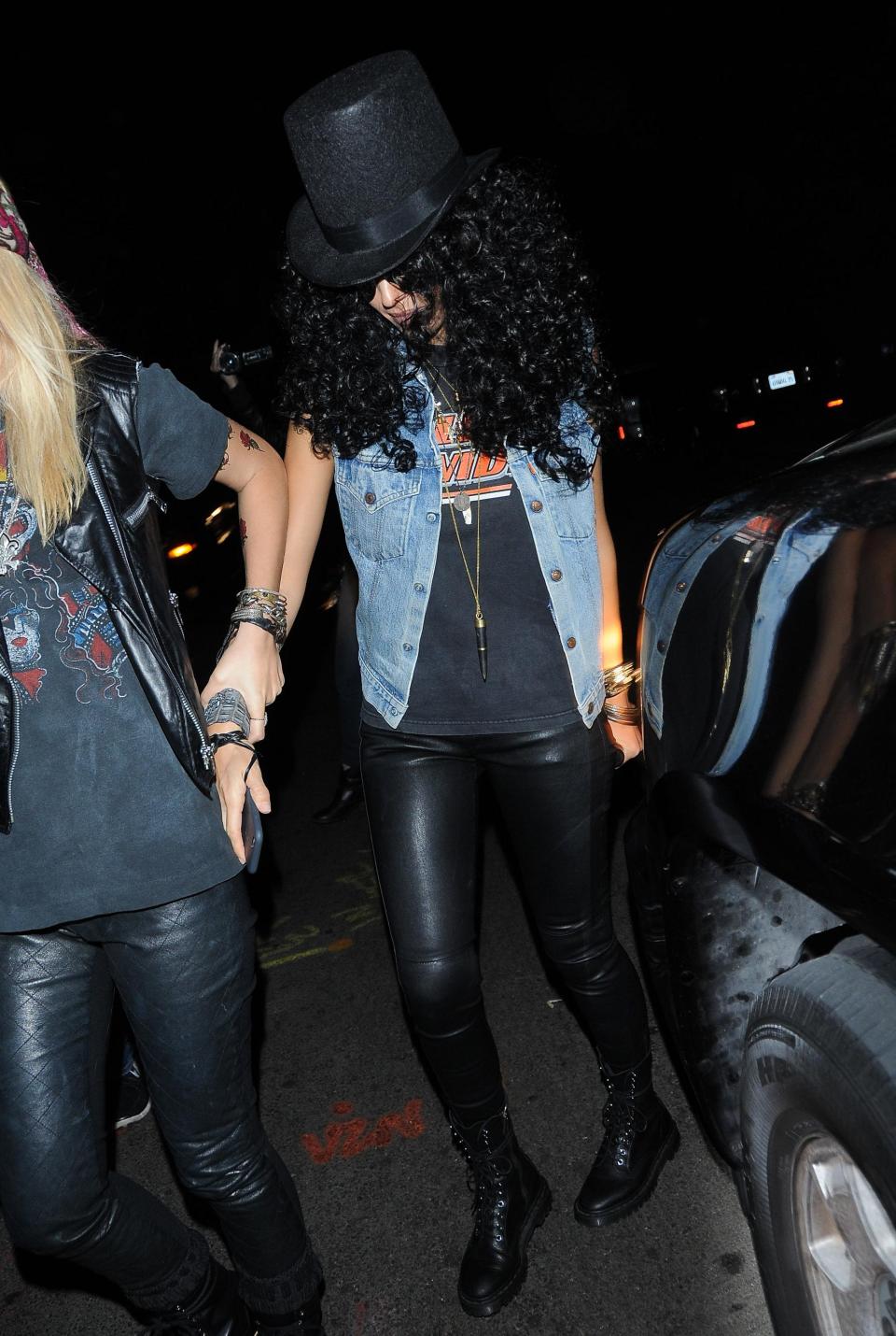 Aside from the signature curls, which would require a wig for most, dressing up as Slash from Guns' Roses couldn't be easier, which Jessica Alba proves here. Denim vests, rocker T-shirts, and faux leather pants are wardrobe essentials at this point.