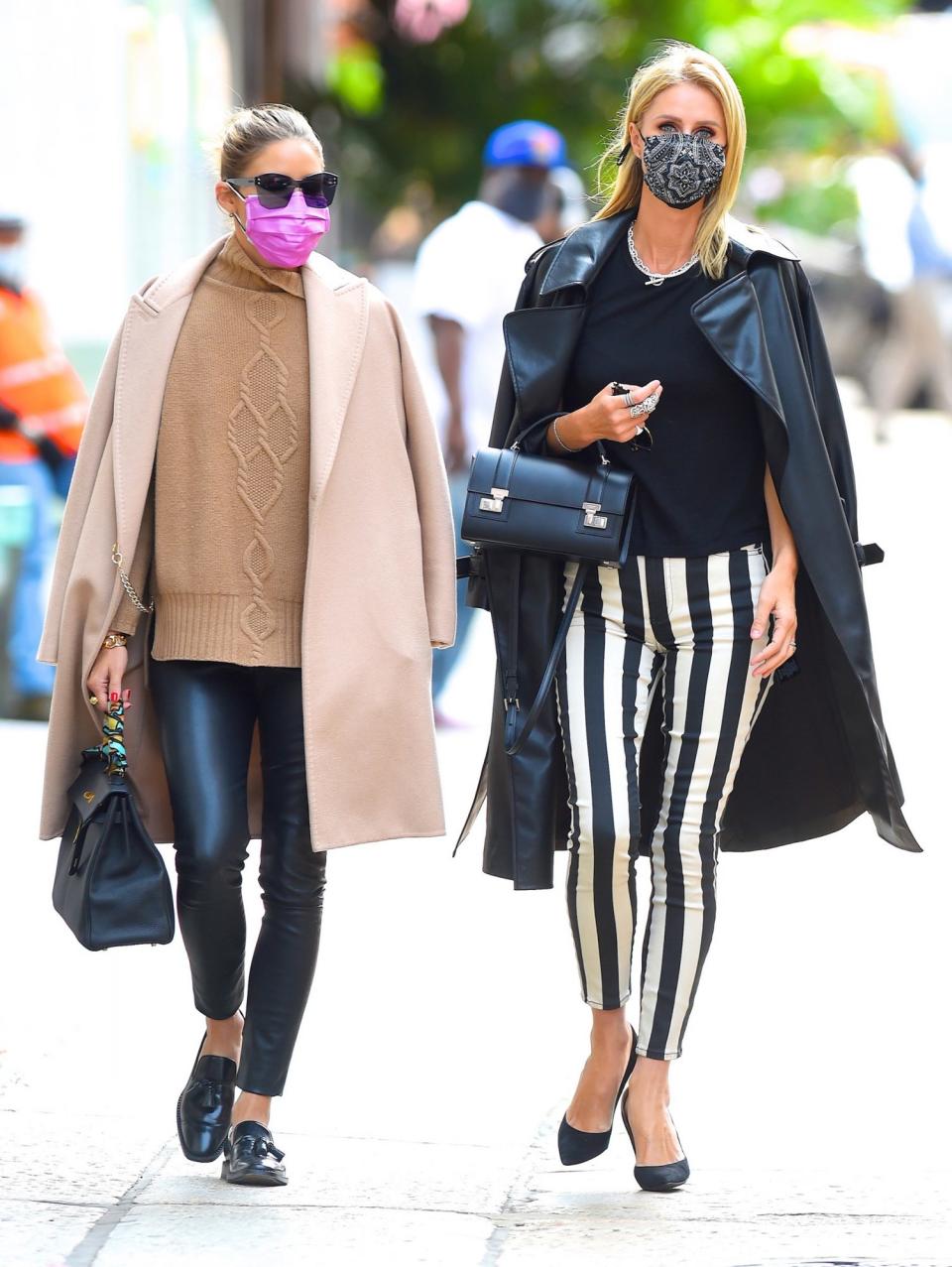 <p>Olivia Palermo and Nicky Hilton Rothschild take a stroll through N.Y.C. on Wednesday.</p>