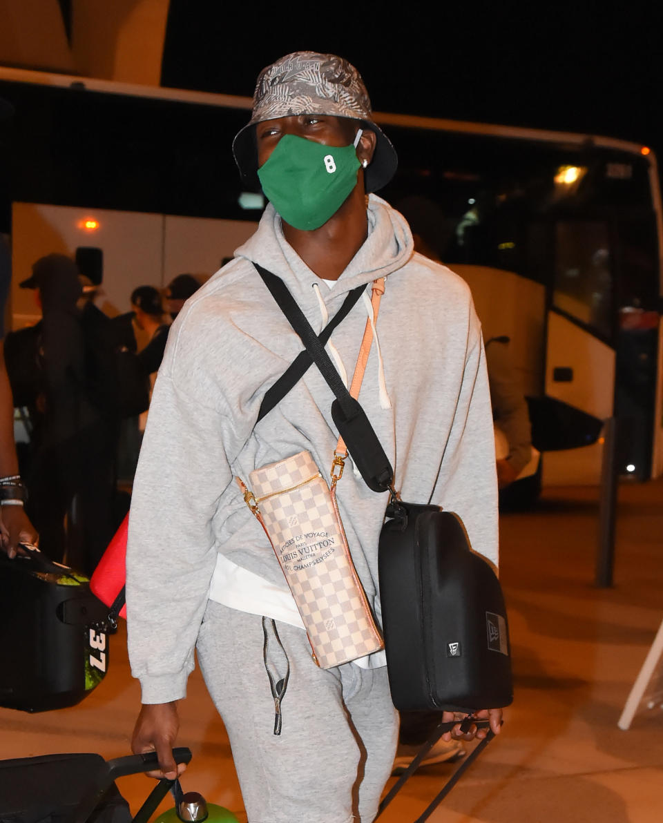 Kemba Walker #8 of the Boston Celtics arrives at the hotel as part of the NBA Restart 2020 on July 8, 2020 in Orlando, Florida. (Photo by Bill Baptist/NBAE via Getty Images)