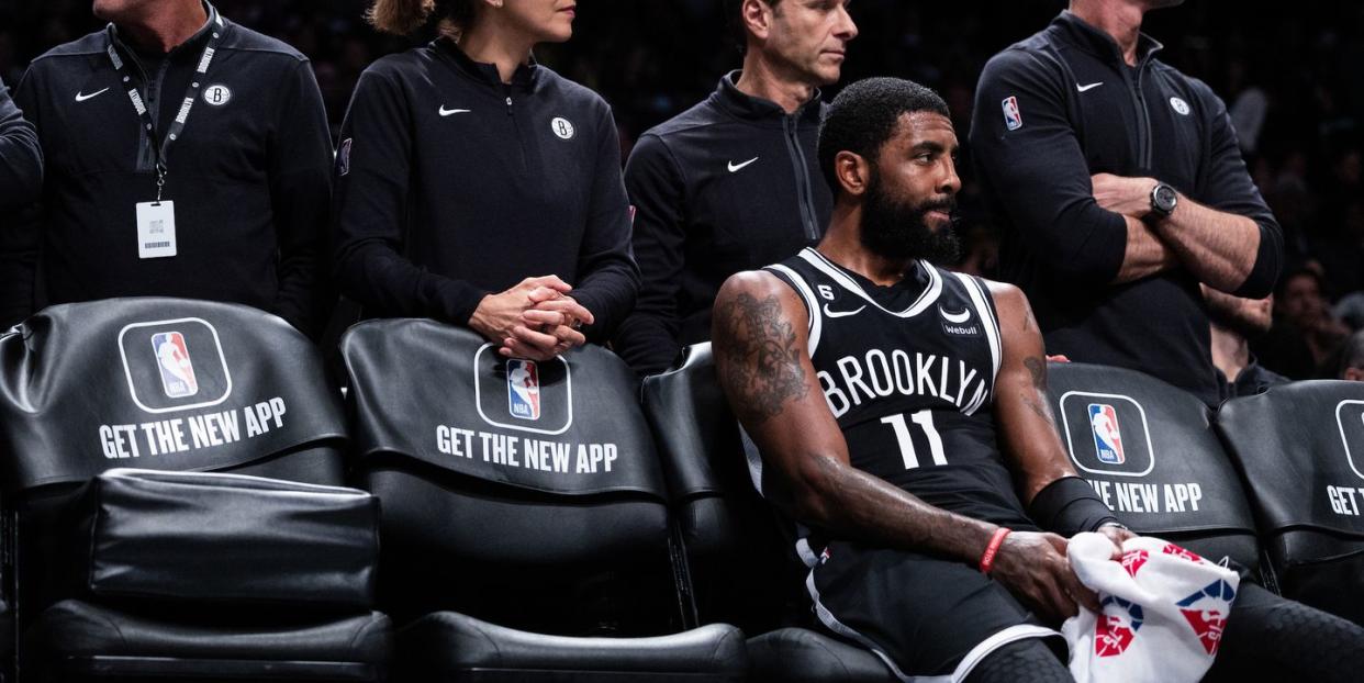 new york, new york   november 01 kyrie irving 11 of the brooklyn nets looks on from the bench during the fourth quarter of the game against the chicago bulls at barclays center on november 01, 2022 in new york city note to user user expressly acknowledges and agrees that, by downloading and or using this photograph, user is consenting to the terms and conditions of the getty images license agreement photo by dustin satloffgetty images