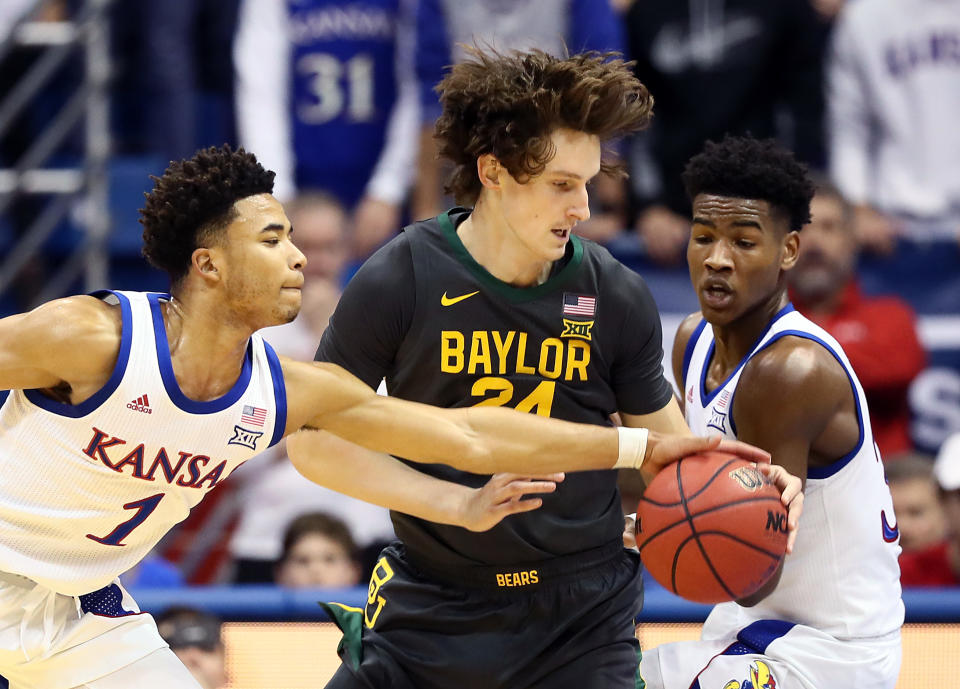 Kansas guard Devon Dotson (L) steals the ball from Baylor's Matthew Mayer during a game at Allen Fieldhouse on Jan.11, 2020. (Jamie Squire/Getty Images)