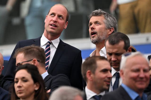 <p>KIRILL KUDRYAVTSEV/AFP via Getty </p> Prince William and King Frederik of Denmark attend the UEFA Euro 2024 soccer match between Denmark and England at the Frankfurt Arena on June 20, 2024