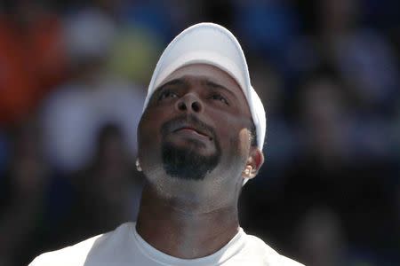 Tennis - Australian Open - Margaret Court Arena, Melbourne, Australia, January 16, 2018. Donald Young of the U.S. reacts during his match against Novak Djokovic of Serbia. REUTERS/Issei Kato