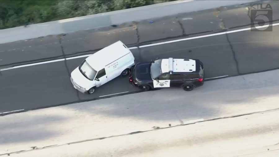 The first PIT maneuver after the suspect drove away on the westbound 91 Freeway was unsuccessful. (KTLA)